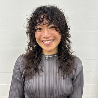 Bouncy, defined curls from a modern spiral perm.